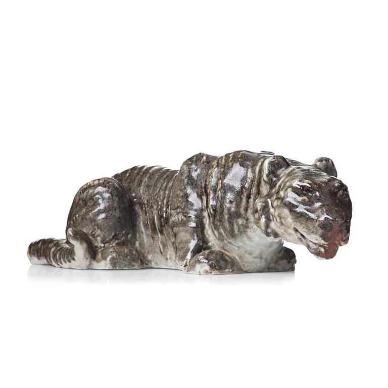 Michael Schilkin, a large stoneware sculpture of a hunting tiger, Arabia, Finland 1940's.