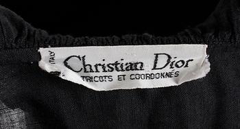 A blouse by Christian Dior.