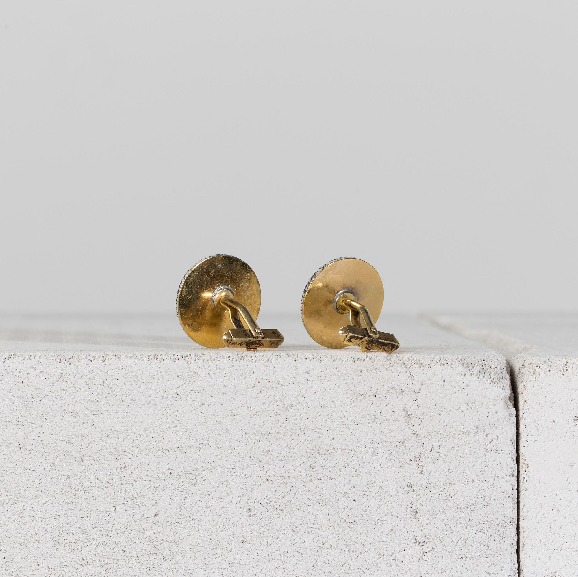 MANSCHETTKNAPPAR, ett par, Fornasetti.