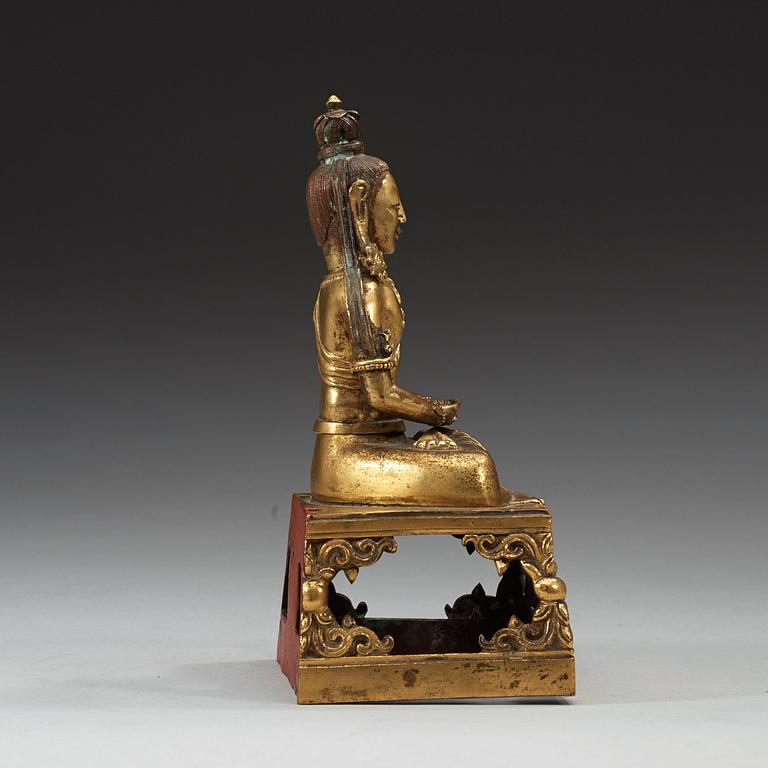 A gilt bronze figure of Amitayus, Qing dynasty with Qianlong mark and period, dating corresponding to 1780.