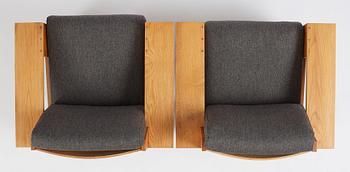 Uno & Östen Kristiansson, a pair of armchairs, an ottoman and a table model "Breda", Luxus, Vittsjö 1960s.