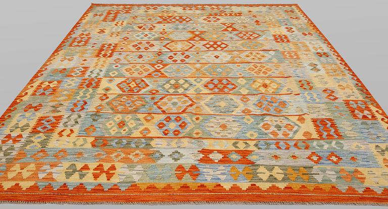 A carpet, Kilim, ca 297 x 252 cm.