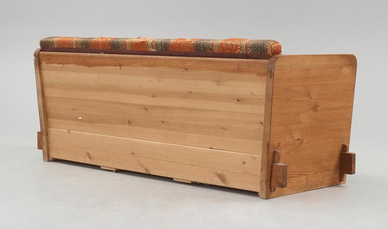 Axel Einar Hjorth, a 'Lovö' stained pine sofa, Nordiska Kompaniet, Sweden 1930's.