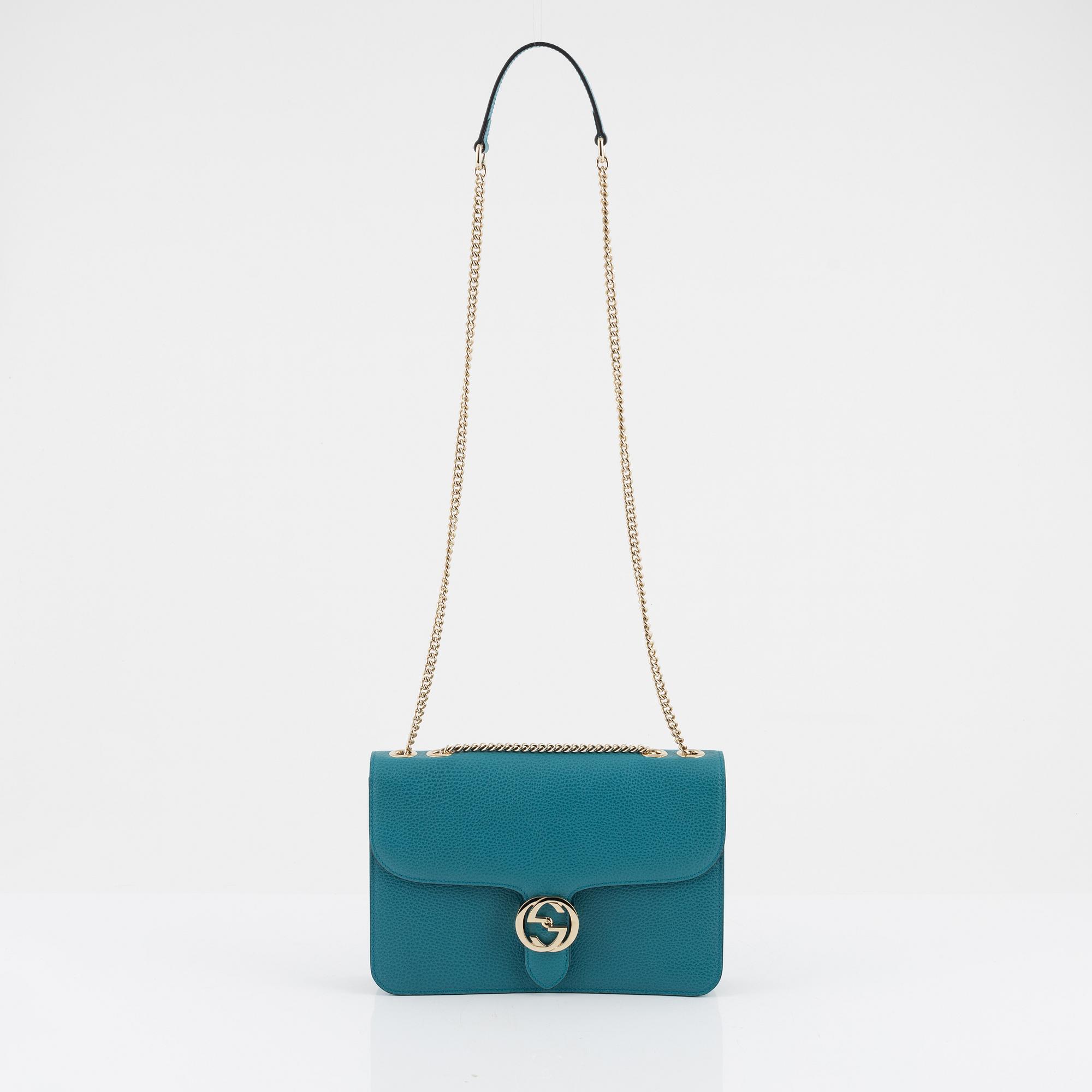 Gucci, a pebbled leather 'Interlocking G' bag.