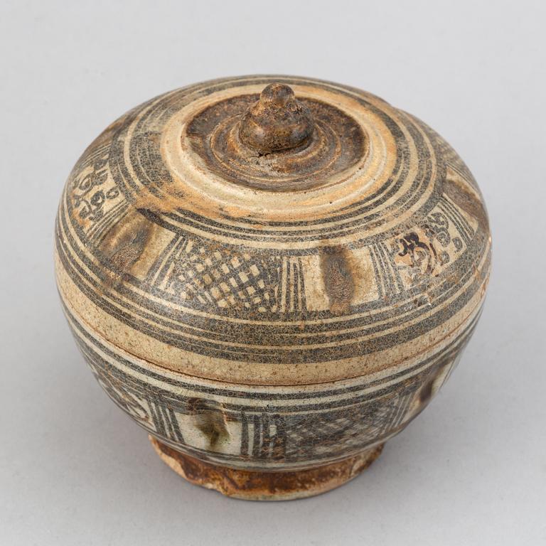 A Sawankhalok jar with cover and a pale celadon glazed bowl for the South East Asian market.