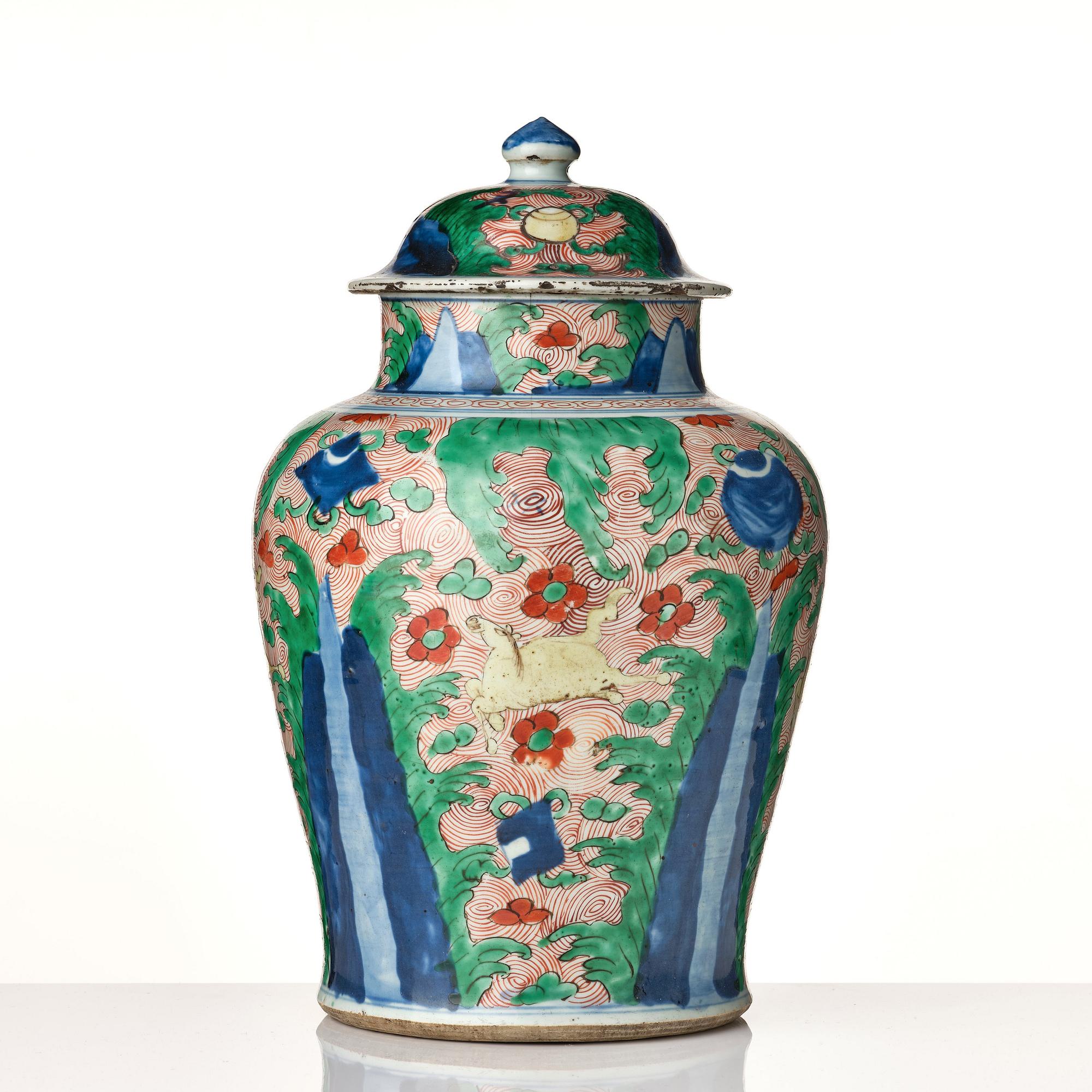 A pair of Transitional Wucai jars, 17th Century.
