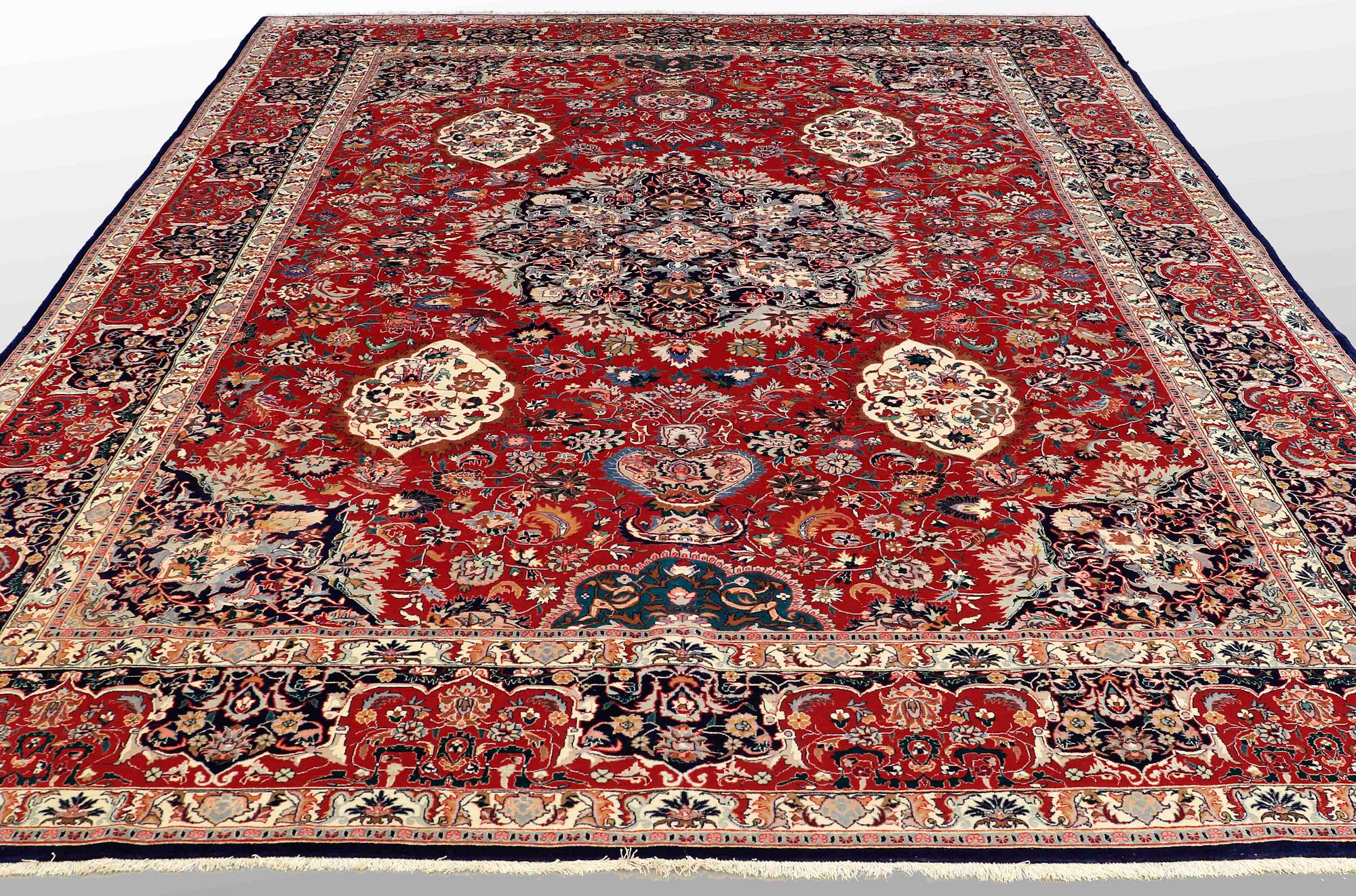 A CARPET, Tabriz, possibly, part silk, ca 417 x 300 cm.