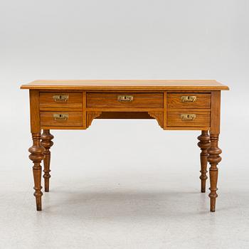 A renaissance style oak writing desk, end of the 19th Century.