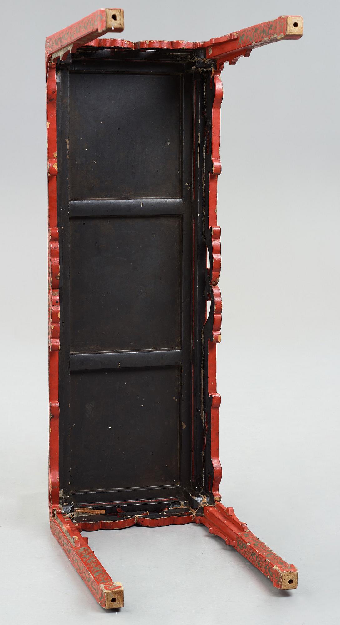A Chinese lacquered table, Qing dynasty (1664-1912).