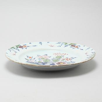 A faience dish, 18th century.