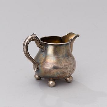 A RUSSIAN CREAM JUG, silver, St:Petersburg 1887, Nikolai Kemper.