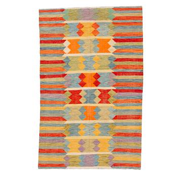 A kilim carpet, c 308 x 194 cm.