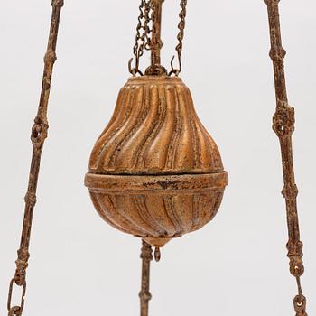 A ceiling carosene lamp, circa 1900.