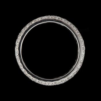A pave-set diamond ring, 3.30 cts in total.