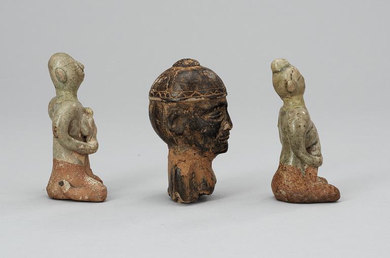 A set of three pottery figures, South America and Thailand.