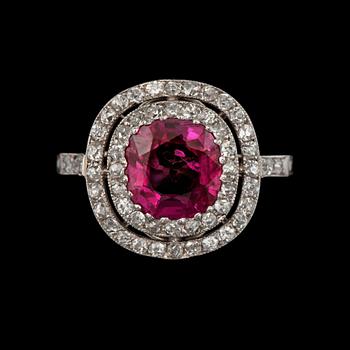 A 2.05 ct untreated Burmese ruby surrounded by old-cut diamonds, total carat weight circa 0.50 ct.