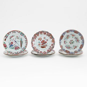 A group of nine Chinese famille rose porcelain plates, Qing dynasty, Yongzheng (1723-35) and Qianlong (1736-95).