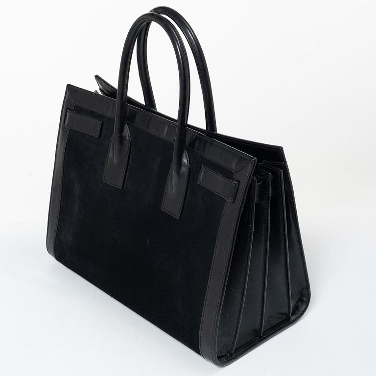 Yves Saint Laurent, a 'Sac du Jour' handbag.