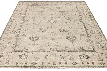 An oriental carpet with Mamluk-design, c. 360 x 280 cm.