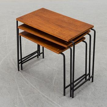 a mid 20th century 3-part coffee table.