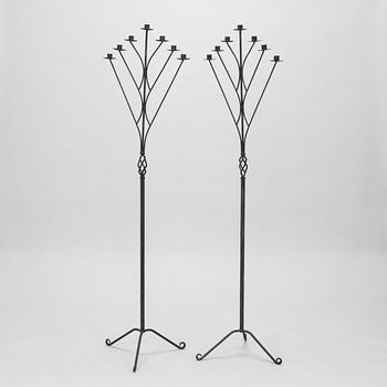 A pair of floor candleholders, 1950s.