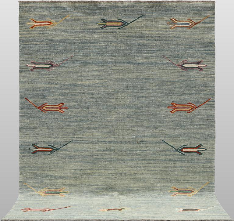 A Kelim carpet, c. 238 x 174 cm.