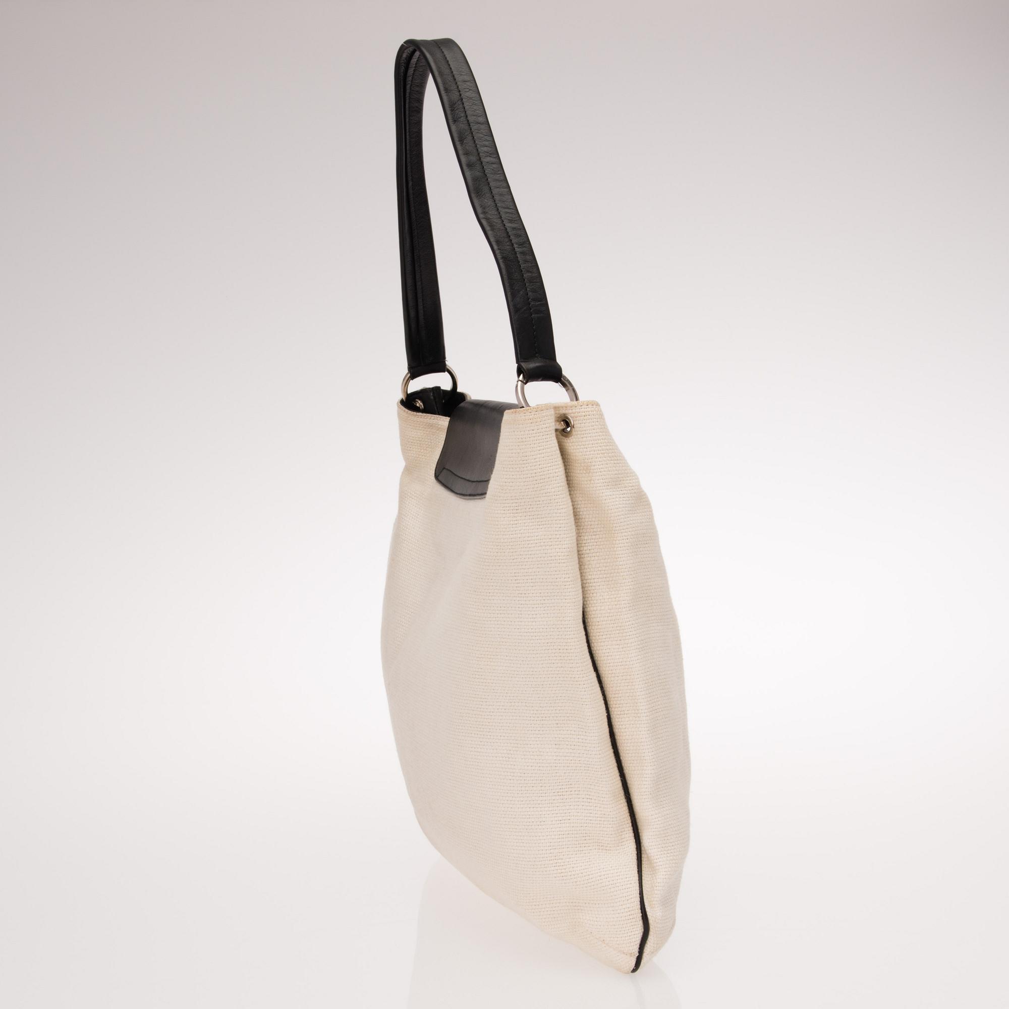 OFF-WHITE JUTE SHOULDER BAG.