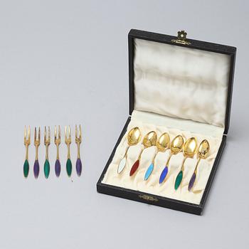 12 gilded silver spoons and small forks from Norway, around the mid 20th century.