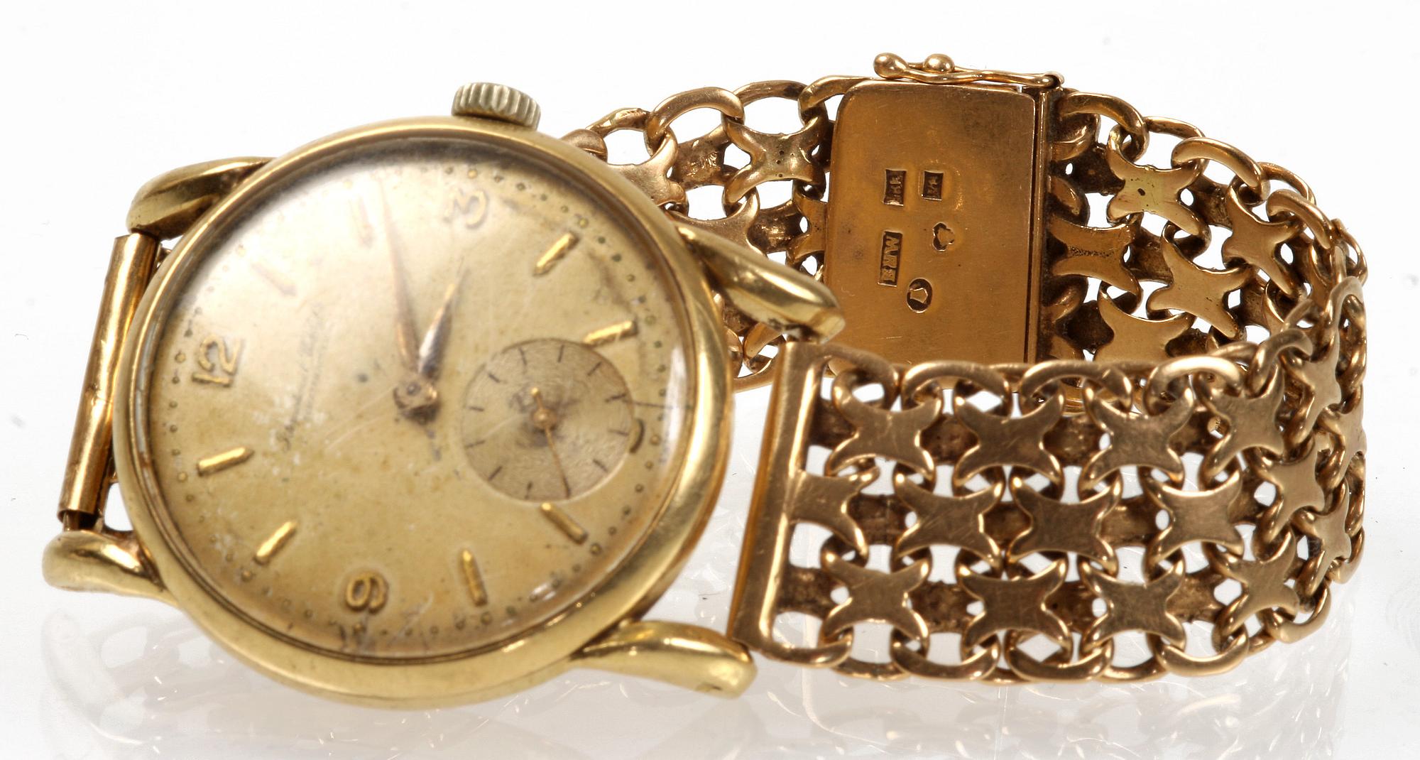 ARMBANDSUR, 18 K guld, EHW, Stockholm, 1947. Tot vikt 68 gr.