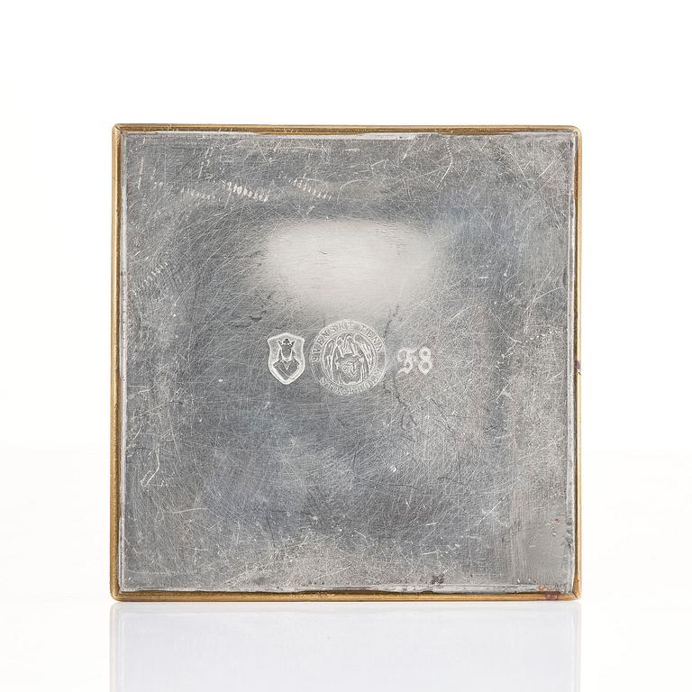 Nils Fougstedt, pennkopp, tenn och mässing, modell A 503, Firma Svenskt Tenn, Stockholm, 1932.