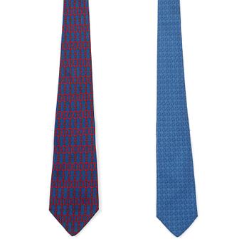 463. A set of two silk ties by Hermès.