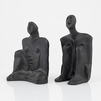 Marita Norin, skulpurer/bokstöd, ett par, monogramsignerade.
