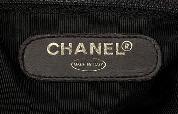 A 1990s black "caviar" leather bag by Chanel.
