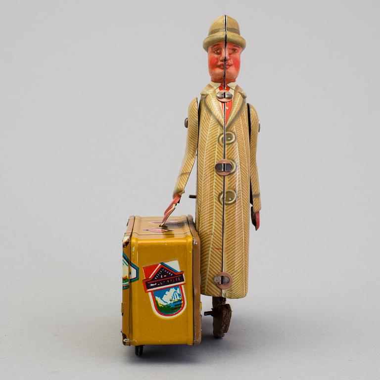A tinplate Fritz Voith man with suitcase, Germany, 1950s.