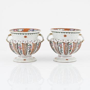 A pair of famille rose flower pots, Qing dynasty, Qianlong (1736-95).