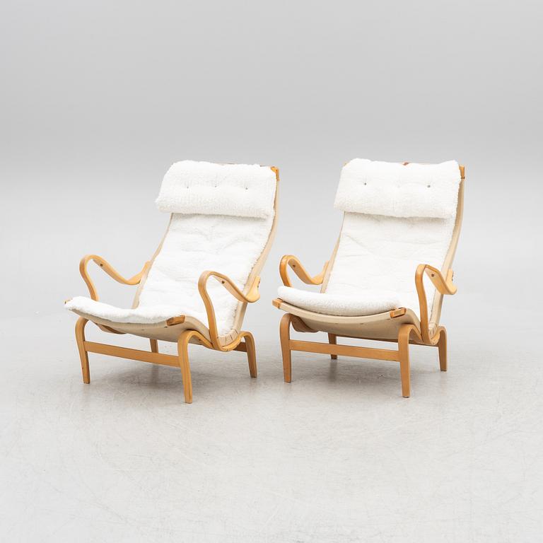 Bruno Mathsson, a pair of 'Pernilla' armchairs, DUX.