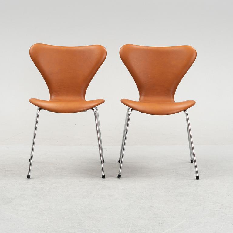 Arne Jacobsen, six leather 'Series 7' chairs, Fritz Hansen, Denmark.