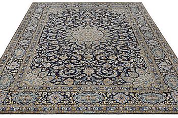 A carpet, Kashan, c. 410 x 311 cm.