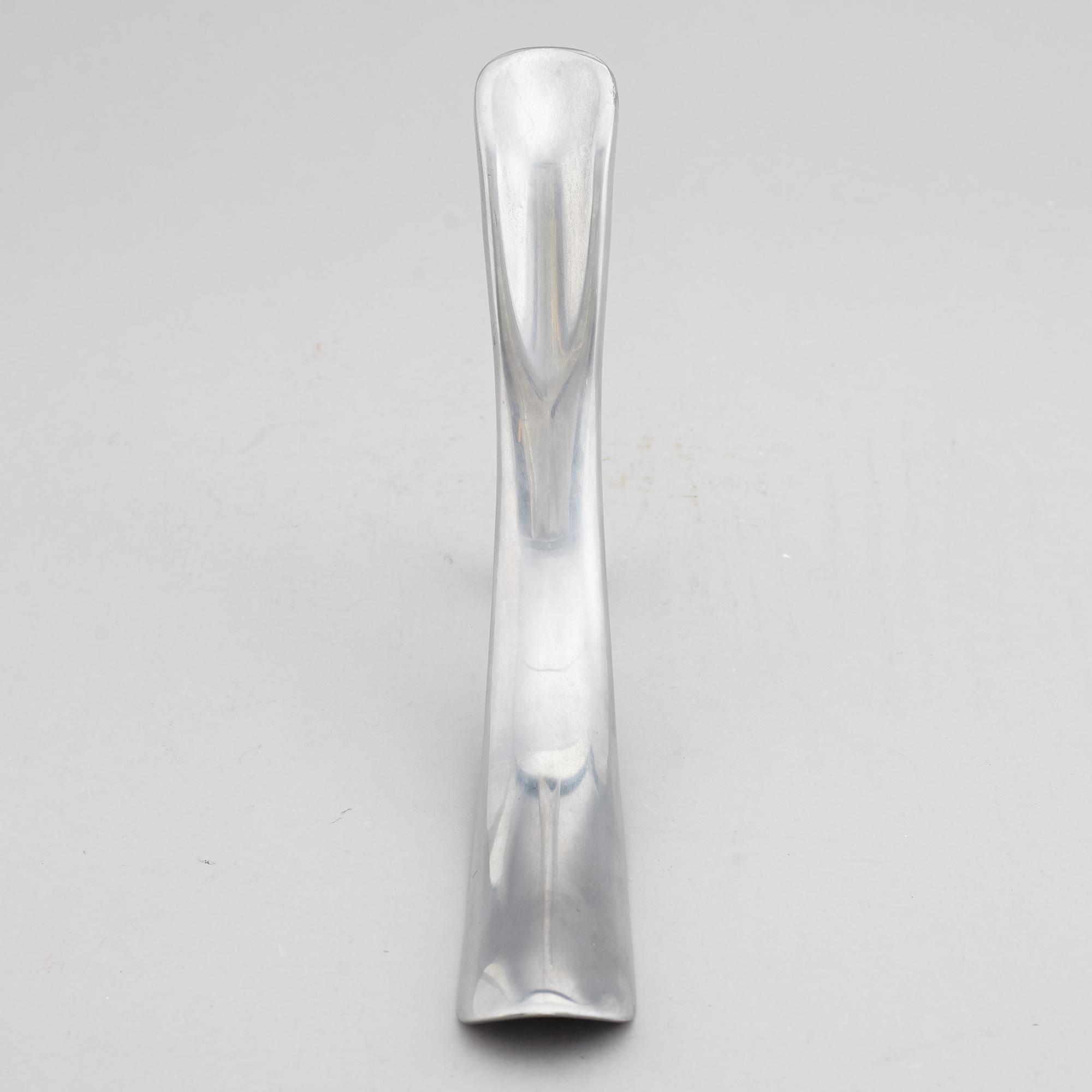 A Manolo Blahnik shoe horn, modern.