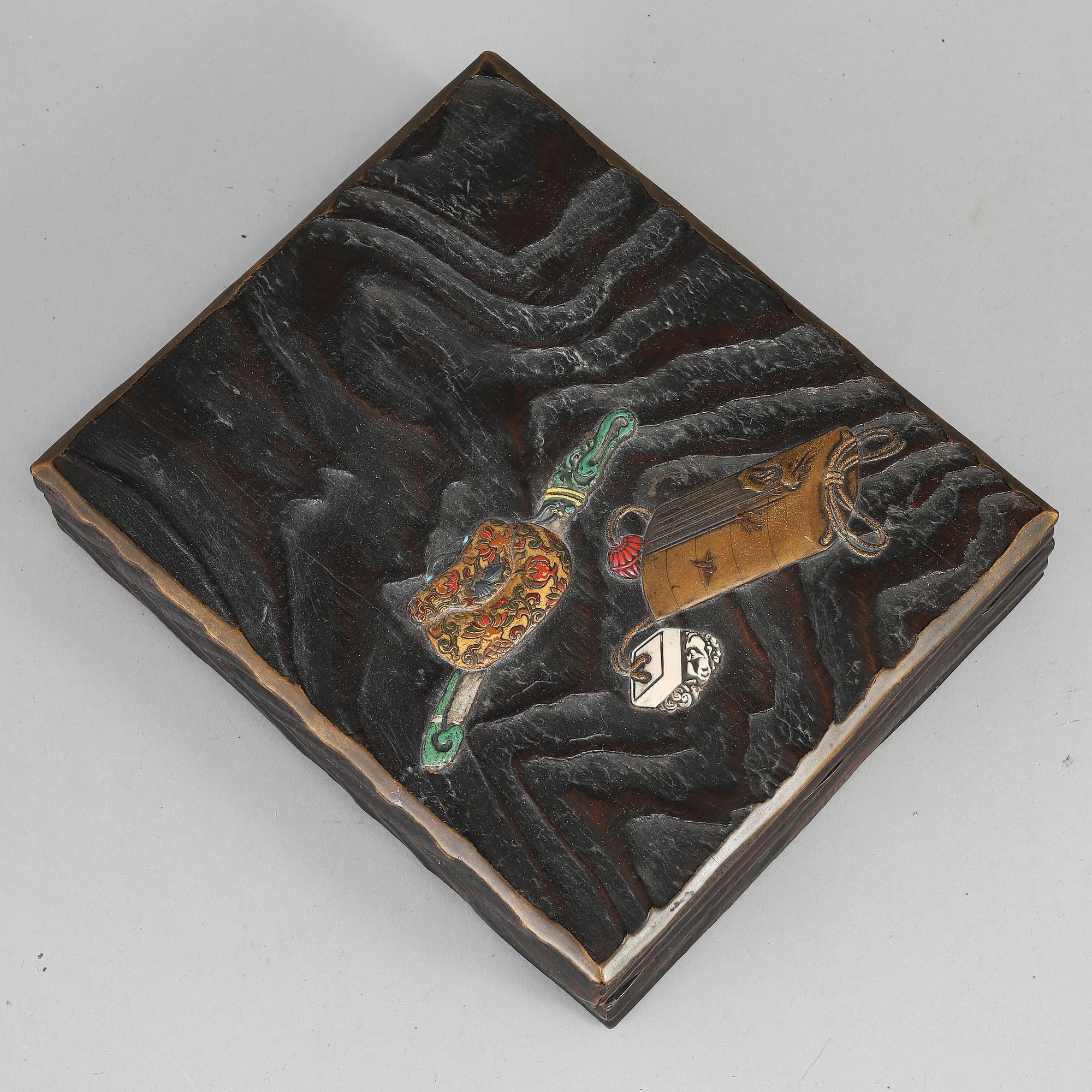 A Japanese lacquered wooden box, Meiji period (1868-1912). Signed inside cover.