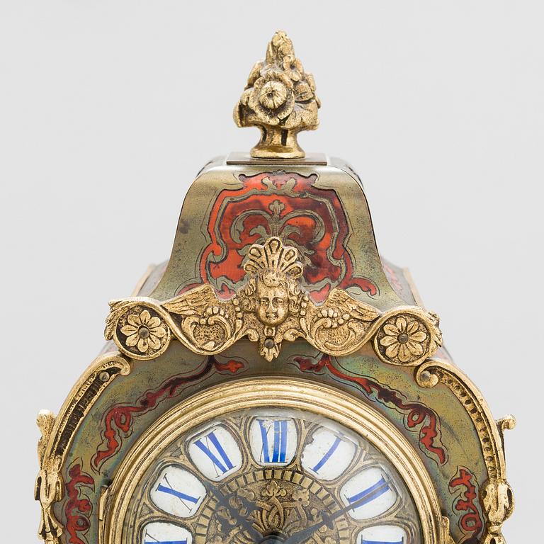 A French boulle style mantel clock, late 19th Century.