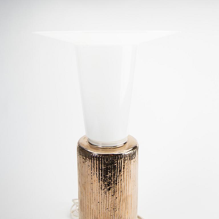 A glass table lamp by Timo Sarpaneva for Linux from the latter half of the 20th century.