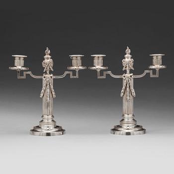 234. A pair of Fabergé, silver candelabra, workmaster Julius Rappoport, S.t Petersburg before 1899.