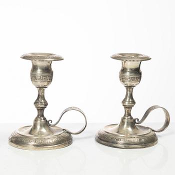 Four pairs och Swedish silver candlesticks, 19th-20th century.