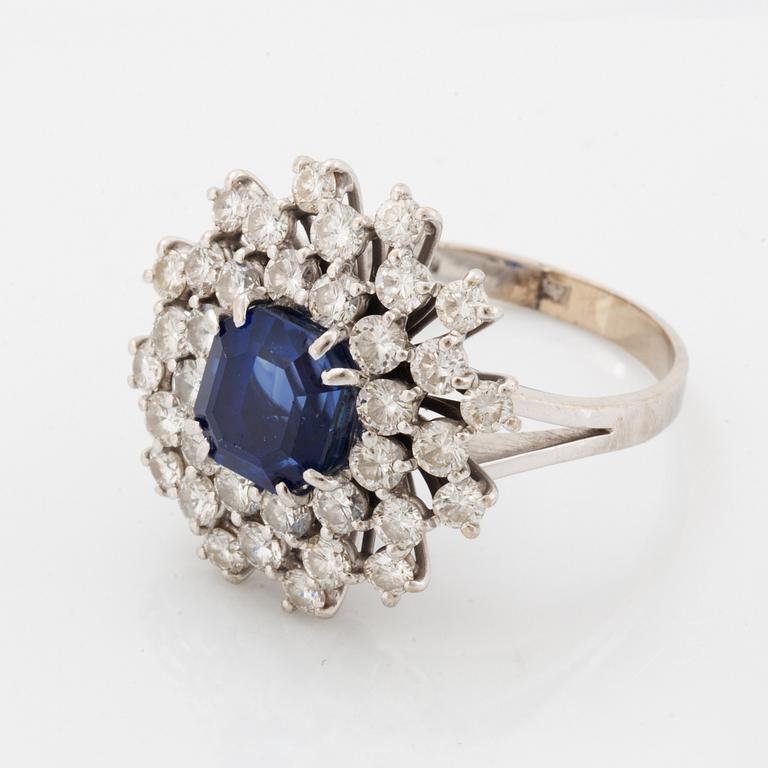 A sapphire and brilliant cut diamond ring.