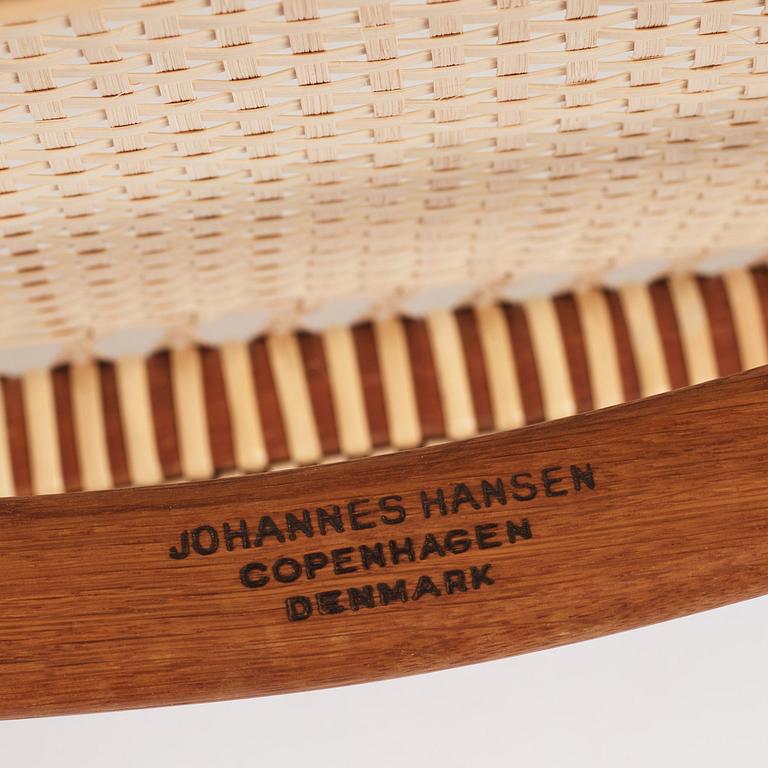 Hans J. Wegner, a pair of teak and rattan 'The Chair', JH-503, Johannes Hansen, Denmark 1950s.