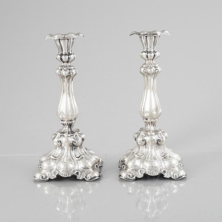 A pair of Baroque style silver candlesticks, mark of CG Hallberg, Stockholm 1936.