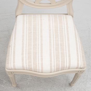 A Gustavian Style Dining Table and 10 Chairs, second half of the 20th Century.
