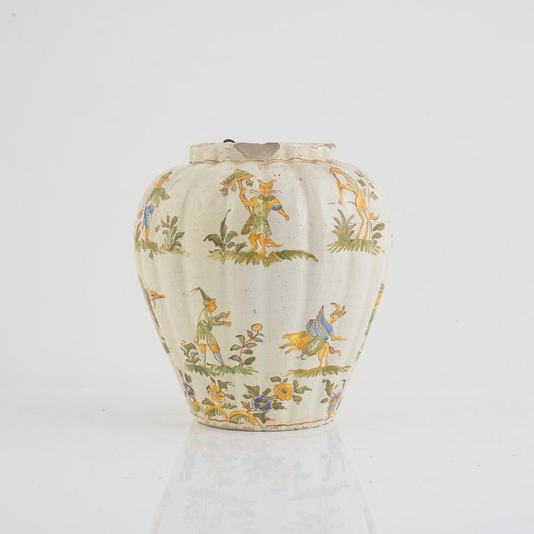 A faience pot, 18th century.