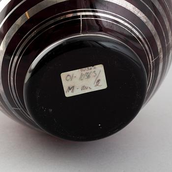 A large glass vase, probably Murano, Italy.
